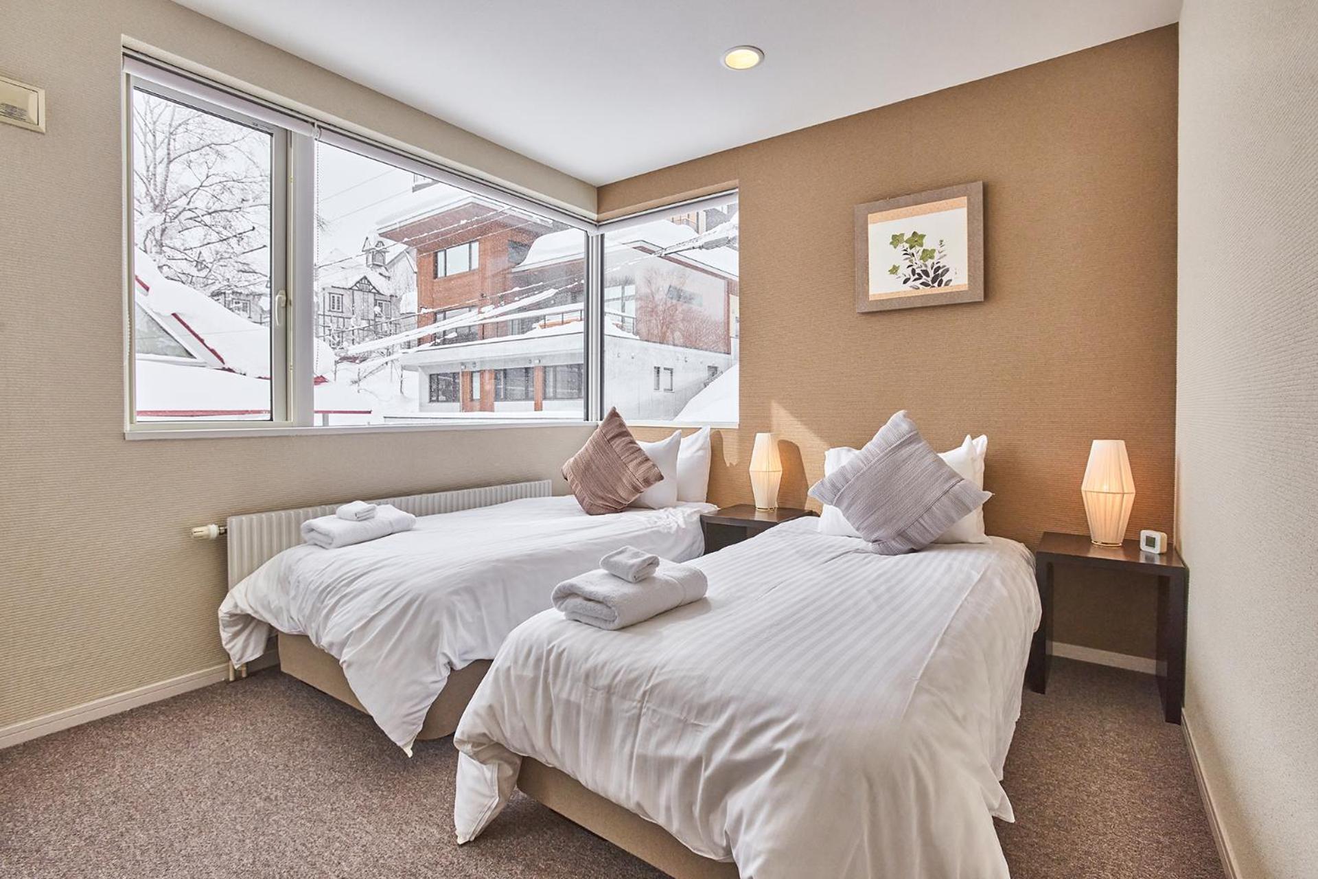 Niseko Central Houses And Apartments Куттян Номер фото