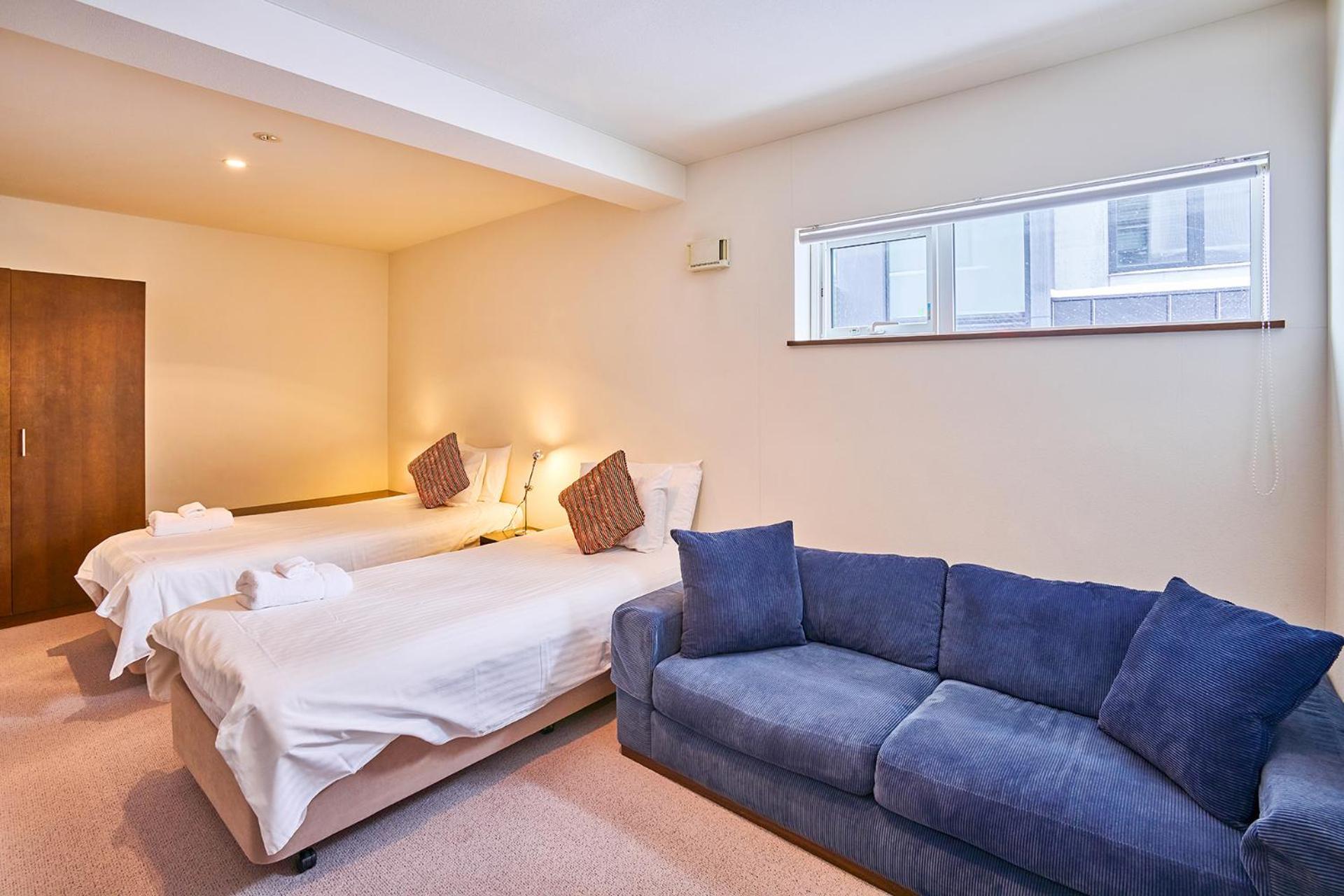 Niseko Central Houses And Apartments Куттян Номер фото