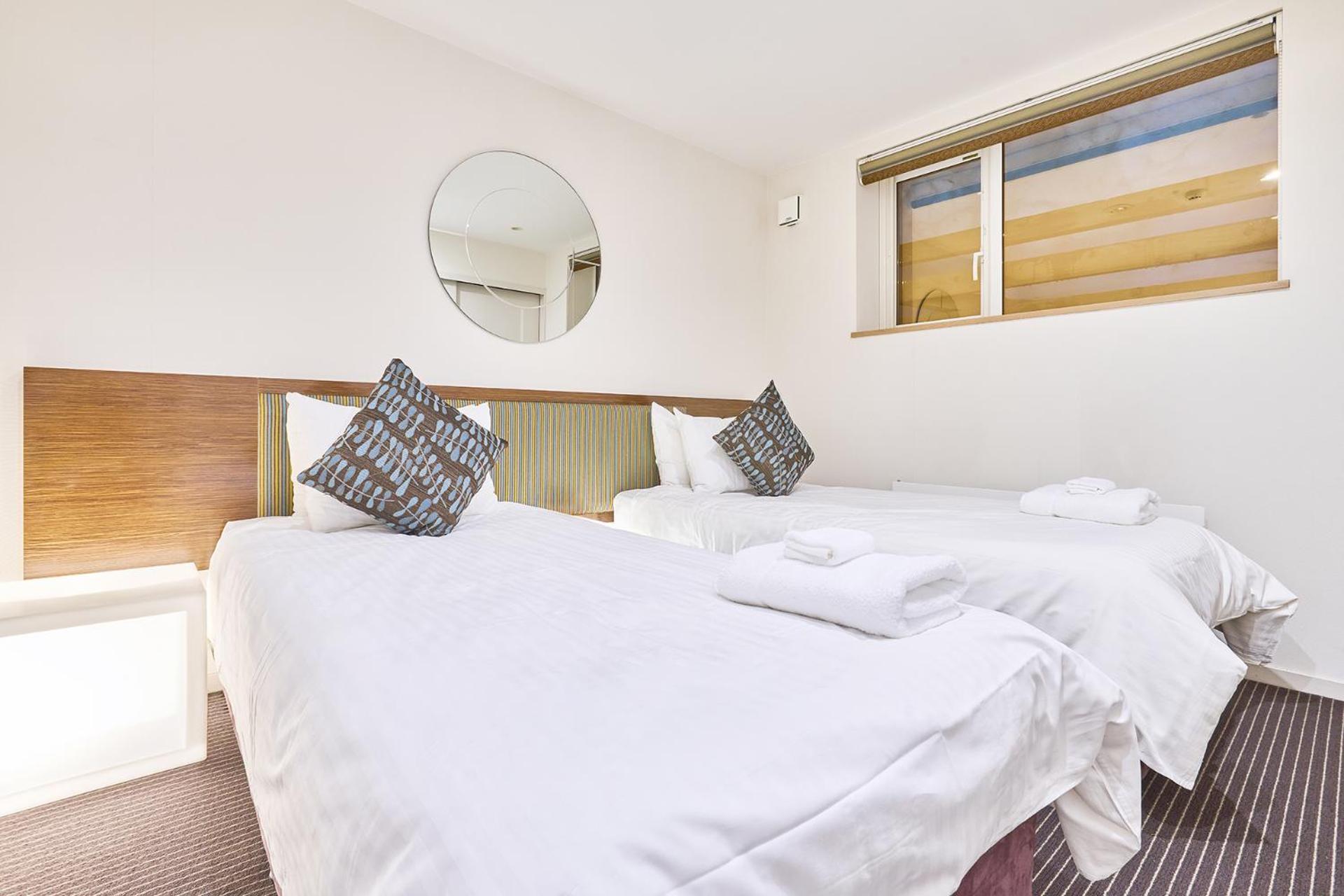 Niseko Central Houses And Apartments Куттян Номер фото